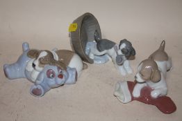 THREE NAO PUPPY FIGURES