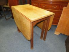 A VINTAGE OAK DROPLEAF TABLE