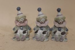 THREE LLADRO PIERROT AND PUPPY FIGURES