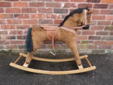 A VINTAGE CHILDS ROCKING HORSE