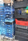 A QUANTITY OF PLASTIC STACKING TRAYS ( CAGE NOT INCLUDED )