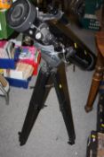 A TASCO 302003 TELESCOPE ON TRIPOD