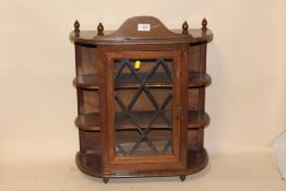 A SMALL WALL HANGING DISPLAY CABINET - HEIGHT 59CM X 51CM
