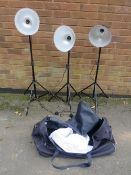 THREE ADJUSTABLE CAMERA LIGHTING STANDS WITH BAG AND APRON (no bulbs)