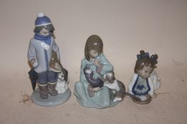 THREE LLADRO FIGURES TO INCLUDE A GIRL WITH A KITTEN AND PUPPY, BOY WITH A DOG AND A BABY GIRL