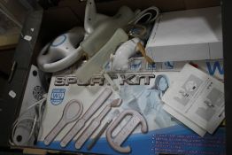 A NINTENDO WII AND ACCESSORIES