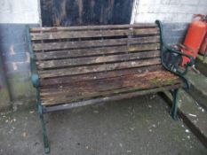 A CAST IRON GARDEN BENCH