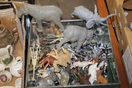 A TIN OF PLASTIC AND LEAD ANIMALS