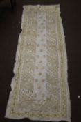 AN ANTIQUE MIDDLE EASTERN DOWRY SHAWL/CLOTH DECORATED WITH HEAVY EMBROIDERED GOLD AND SILVER WIRE