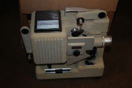 A EUMIG BOXED PROJECTOR