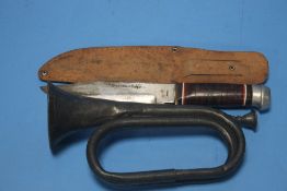 A PEWTER BUGLE TOGETHER WITH A BOWIE KNIFE