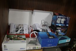 TWO BOXED TELEPHONES AND A BOXED NOKIA 2310 TOGETHER WITH A PANASONIC CORDLESS TELEPHONE, A