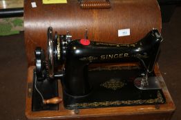 A CASED SINGER SEWING MACHINE