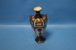 A ROYAL CROWN DERBY SMALL URN, H 18 CM¦Condition Report:Repairs around the top, chip to one handle¦