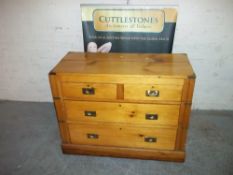A PINE FOUR DRAWER CAMPAIGN CHEST, TWO OVER TWO DRAWERS
