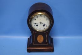 A MAHOGANY INLAID MANTEL CLOCK