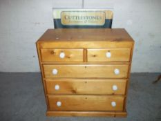 A PINE FIVE DRAWER CHEST, TWO OVER THREE DRAWERS