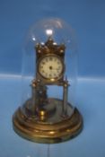 A BLACK DOMED MANTEL CLOCK, NO MAKER'S MARK, H 30 CM