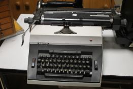 AN ADLER UNIVERSAL 390 TYPEWRITER
