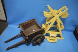 A WOODEN MODEL OF A FAIRGROUND RIDE TOGETHER WITH A WOODEN CART (2)
