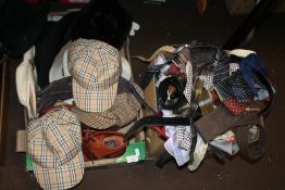 A TRAY OF HATS TO INCLUDE BURBERRY AND A BOX OF ASSORTED TIES