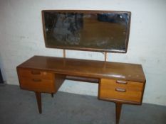 A TEAK DRESSING TABLE
