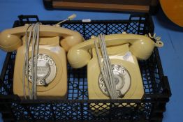 A PAIR OF VINTAGE CREAM DIAL TELEPHONES WITH MODERN NETWORK CONNECTION