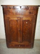 AN ANTIQUE EDWARDIAN CORNER CUPBOARD