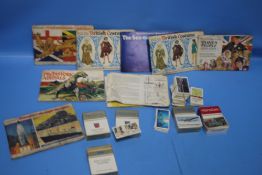 A QUANTITY OF TEA AND CIGARETTE CARDS, LOOSE AND IN ALBUMS, TO INCLUDE BROOKE BOND, WILLS, ETC.