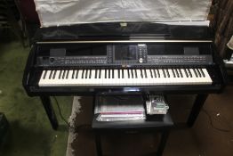 A YAMAHA CLAVINOVA CVP-409/407 ELECTRIC PIANO WITH STOOL AND INSTRUCTIONS