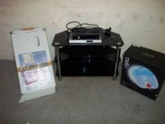 FOUR ITEMS COMPRISING A DVD PLAYER, A GLASS TV STAND, A FOOT SPA AND A BATH LIFT