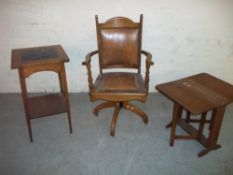 AN ANTIQUE OAK SWIVEL CHAIR AND A TILE TOPPED OAK TABLE TOGETHER WITH A DROP LEAF OAK TABLE