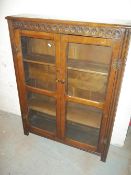 AN ANTIQUE OAK BOOKCASE
