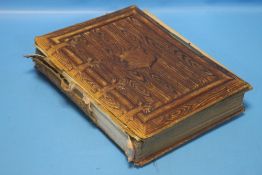 A VICTORIAN PHOTOGRAPH ALBUM WITH CONTENTS, INCLUDING CARTE DE VISITE ETC