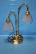 A BRASS LAMP WITH VASELINE GLASS SHADES