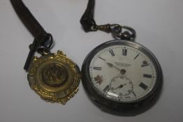 A HALLMARKED SILVER KEY WIND POCKET WATCH SIGNED TO DIAL 