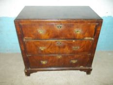 A VINTAGE CHEST OF THREE DRAWERS WITH BRASS HANDLES