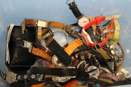 A TUB OF WRIST WATCHES