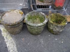 THREE CONCRETE PLANTERS