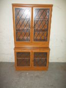 A MODERN TEAK WALL DISPLAY UNIT