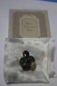 A BOXED CHRISTIAN DIOR BROOCH