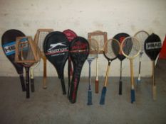 A SELECTION OF BADMINTON AND TENNIS RACQUETS