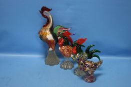 A GRADUATED SET OF GLASS COCKERELS