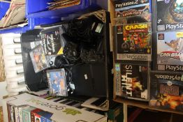 A SONY PLAYSTATION2 TOGETHER WITH A QUANTITY OF GAMES