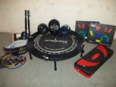 A QUANTITY OF EXERCISE EQUIPMENT INCLUDING HELMETS, TRAMPOLINE ETC.