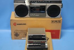 A BOXED SAMSUNG RADIO CASSETTE RECORDER TOGETHER WITH A PYE CASSETTE RECORDER