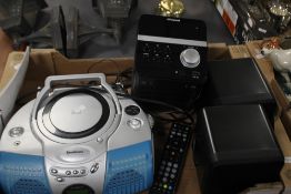 A GOODMAN'S STEREO AND A POLOROID STEREO WITH SPEAKERS