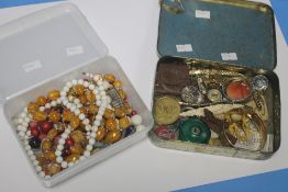 TWO SMALL TUBS OF COSTUME JEWELLERY TO INCLUDE NECKLACES, BRACELETS, WATCH FACES ETC.