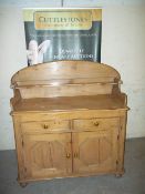 AN ANTIQUE PINE WASHSTAND