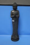 A RESIN FEMALE BUDDHA FIGURE